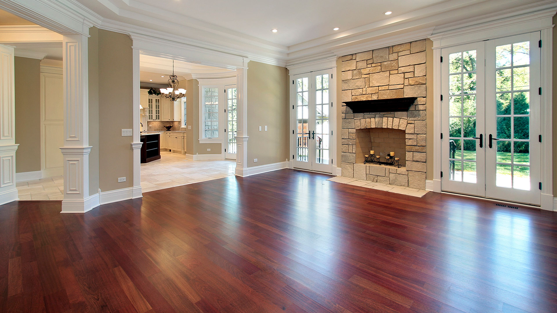 Spacious living room with hardwood floor and fireplace